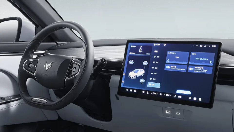 ARCFOX T5 steering wheel and wide central touchscreen showing system settings